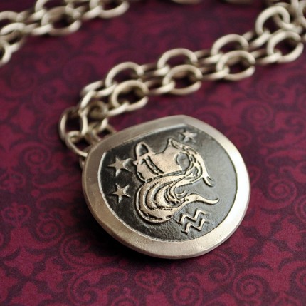 Aquarius the Water Bearer Zodiac Pendant in Sterling Silver